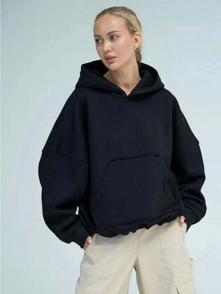 Dame oversized hettegenser med sidelommer og avslappet passform Skjora