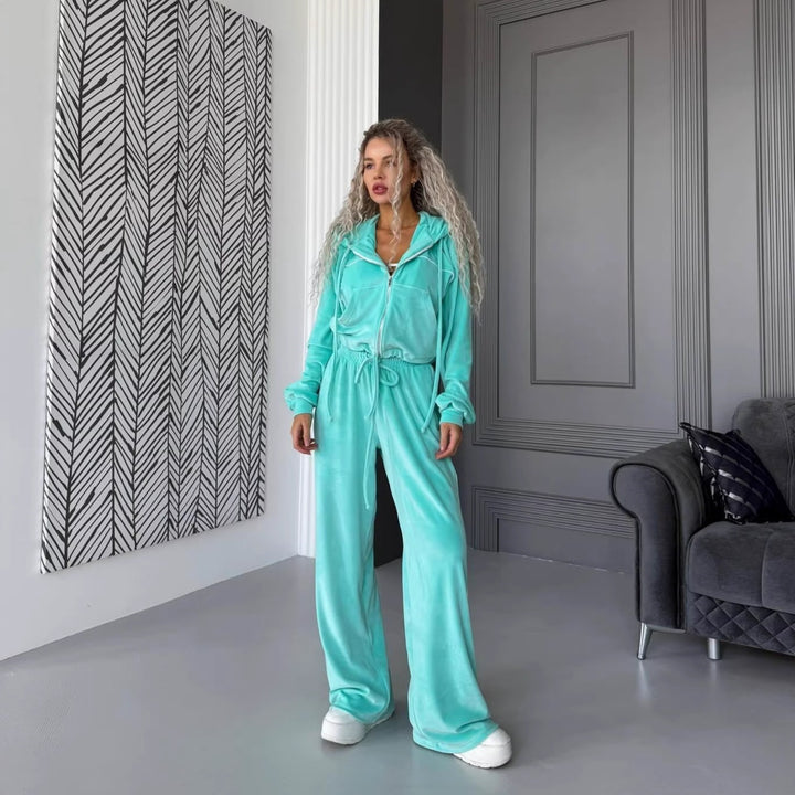 Dame fleece treningsdrakt med høy krage og elegant glidelås