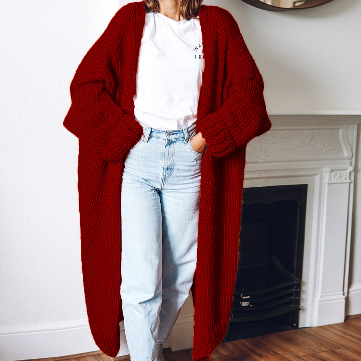 Dame chunky strikket cardigan med komfortabel oversized passform og dype lommer Skjora