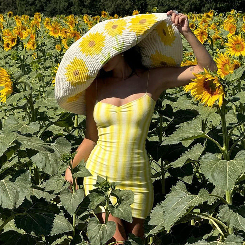 Dame sommerkjole med ermeles design og raffinerte plisseringer Skjora