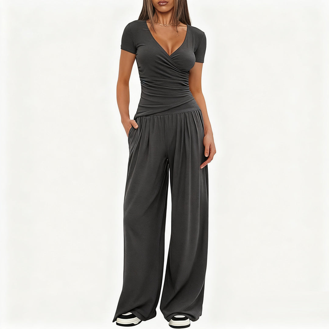 Dame avslappet jumpsuit med omslagsdesign og vid ben Skjora