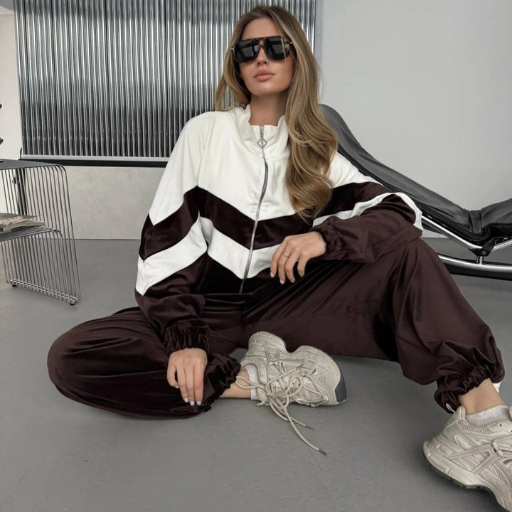 Dame sporty velur treningsdrakt med elegant glidelås og moderne striper Skjora
