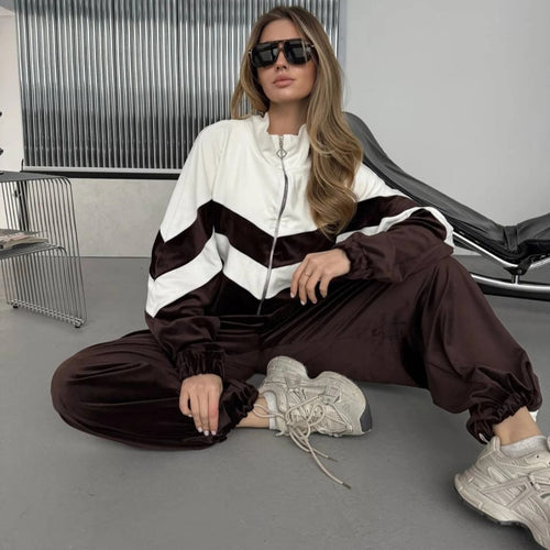 Dame sporty velur treningsdrakt med elegant glidelås og moderne striper Skjora