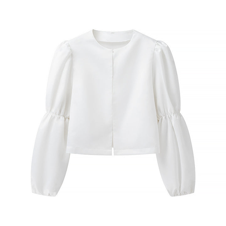Kvinnens elegant skreddersydde bluse med voluminøse ermer Skjora