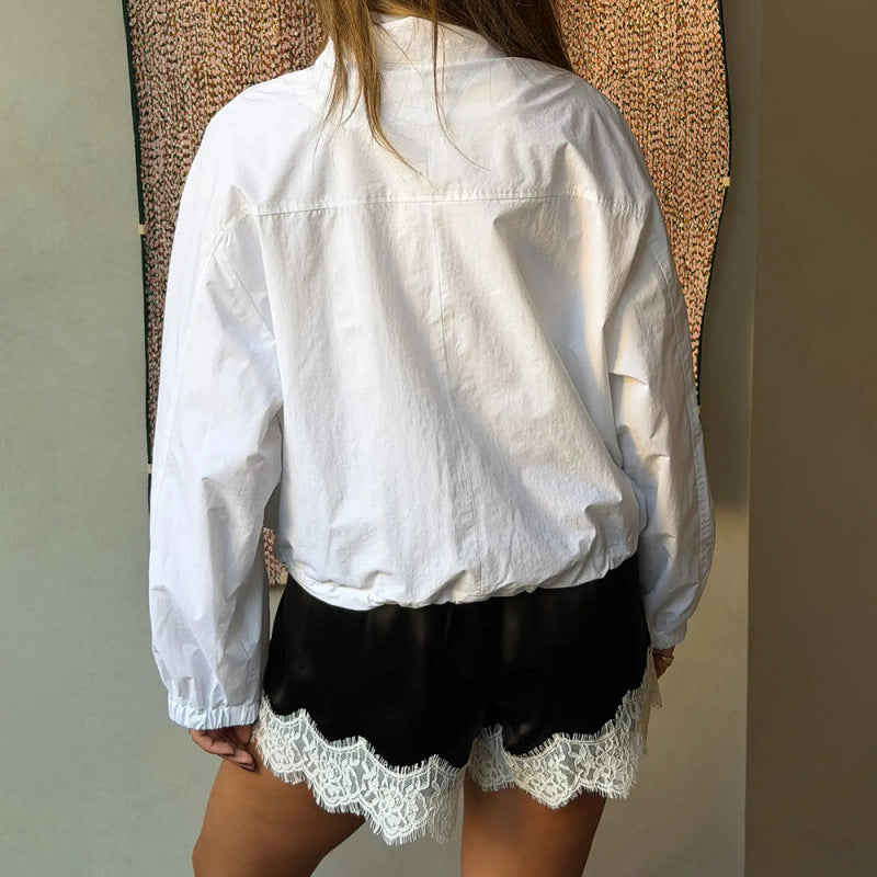 Dame Sportbodysuit med elastiske shorts og blonderdetalj Skjora