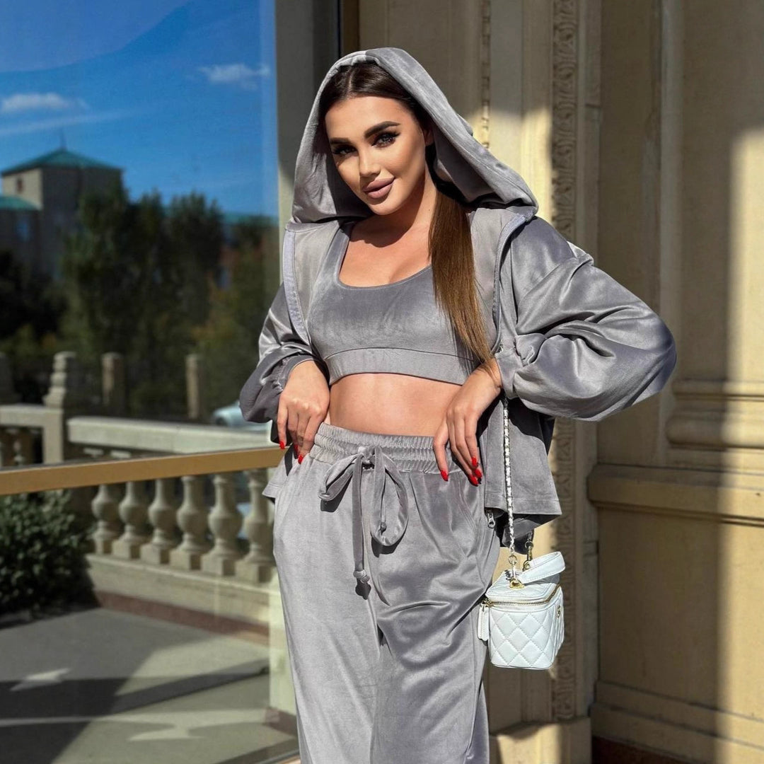 Dame sporty lounge sett i fløyelslook med cropped topp og vide bukser