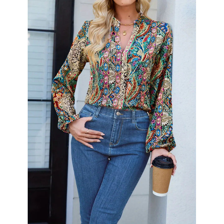 Dame elegant bluse med fargerik trykk og ekstravagante puff-ermer Skjora