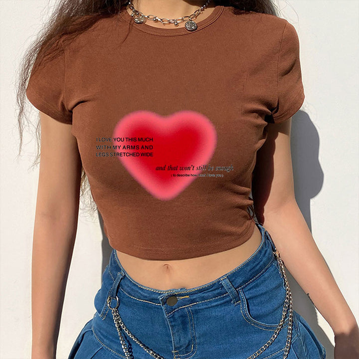 Dame cropped T-skjorte med iøynefallende slogan Skjora