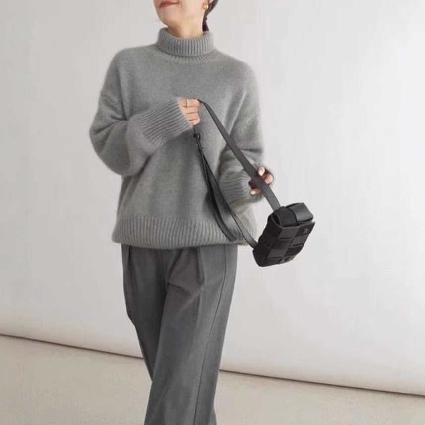 Dame designer turtleneck genser laget av høykvalitets ull Skjora