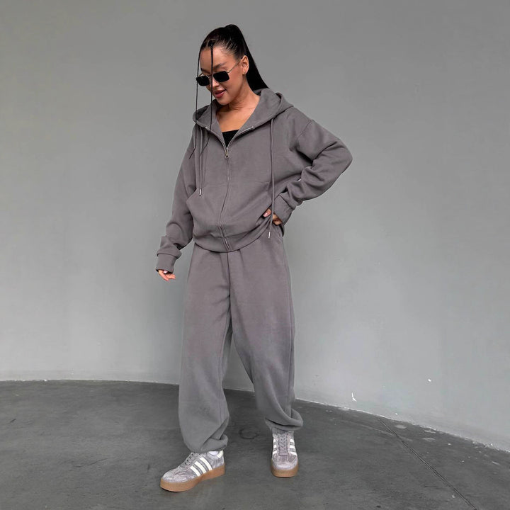 Kvinnekoselig hettegenser jumpsuit med høy kvalitets glidelås og avslappet passform