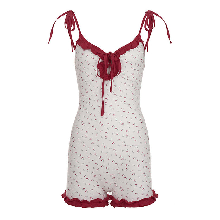 Damer leken jumpsuit med blomsterakenter og volangdetaljer Skjora