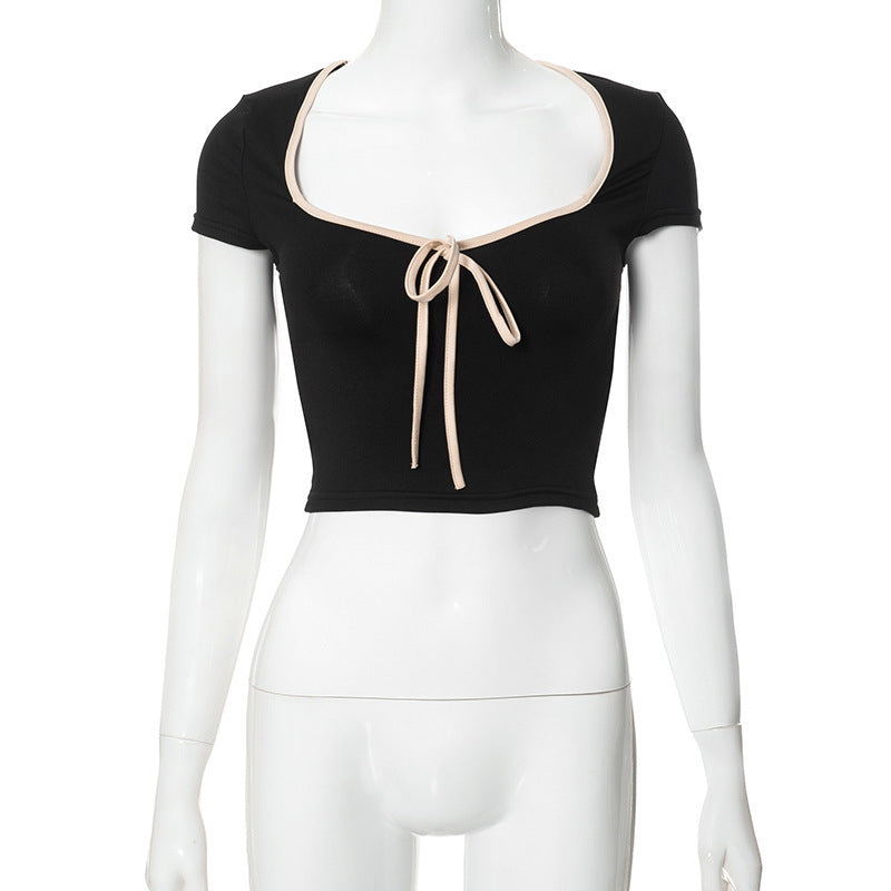 Dame cropped T-shirt med dekorativt bånd Skjora