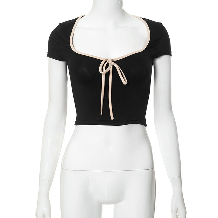 Dame cropped T-shirt med dekorativt bånd Skjora