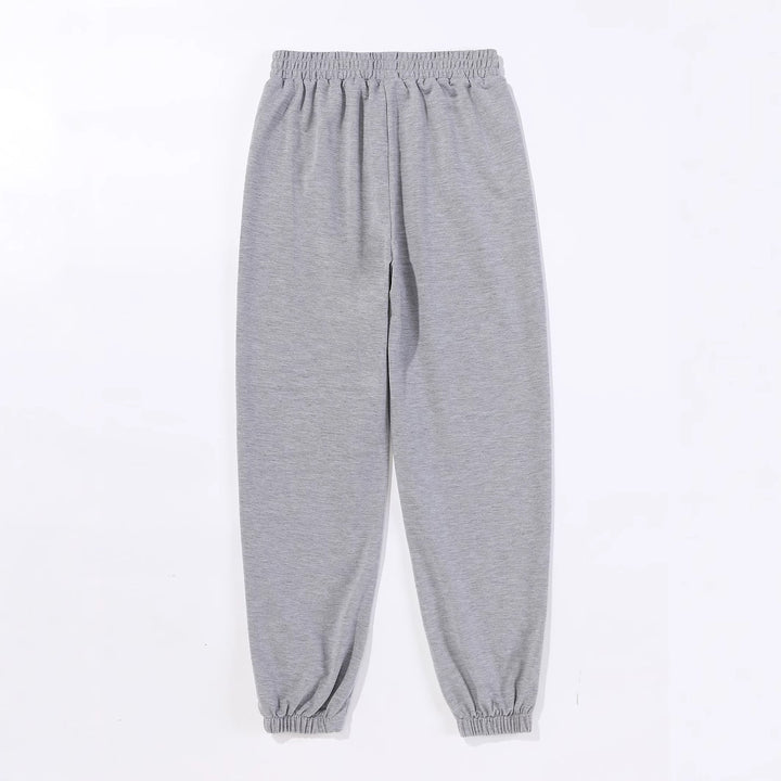 Kvinnenes komfortable joggebukser med trendy solmotiv Skjora