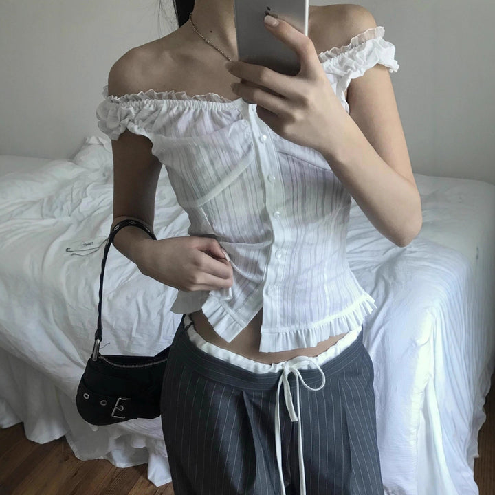 Damer Off-Shoulder Bluse med volangkant og knappdetaljer Skjora
