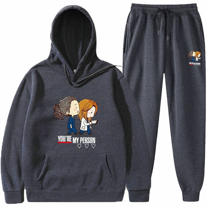Damegenser og joggebukse sett med originalt tegneseriedesign Skjora