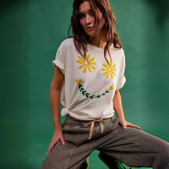 Women's relaxed T-shirt with floral smiley print and oversized fit Skjora