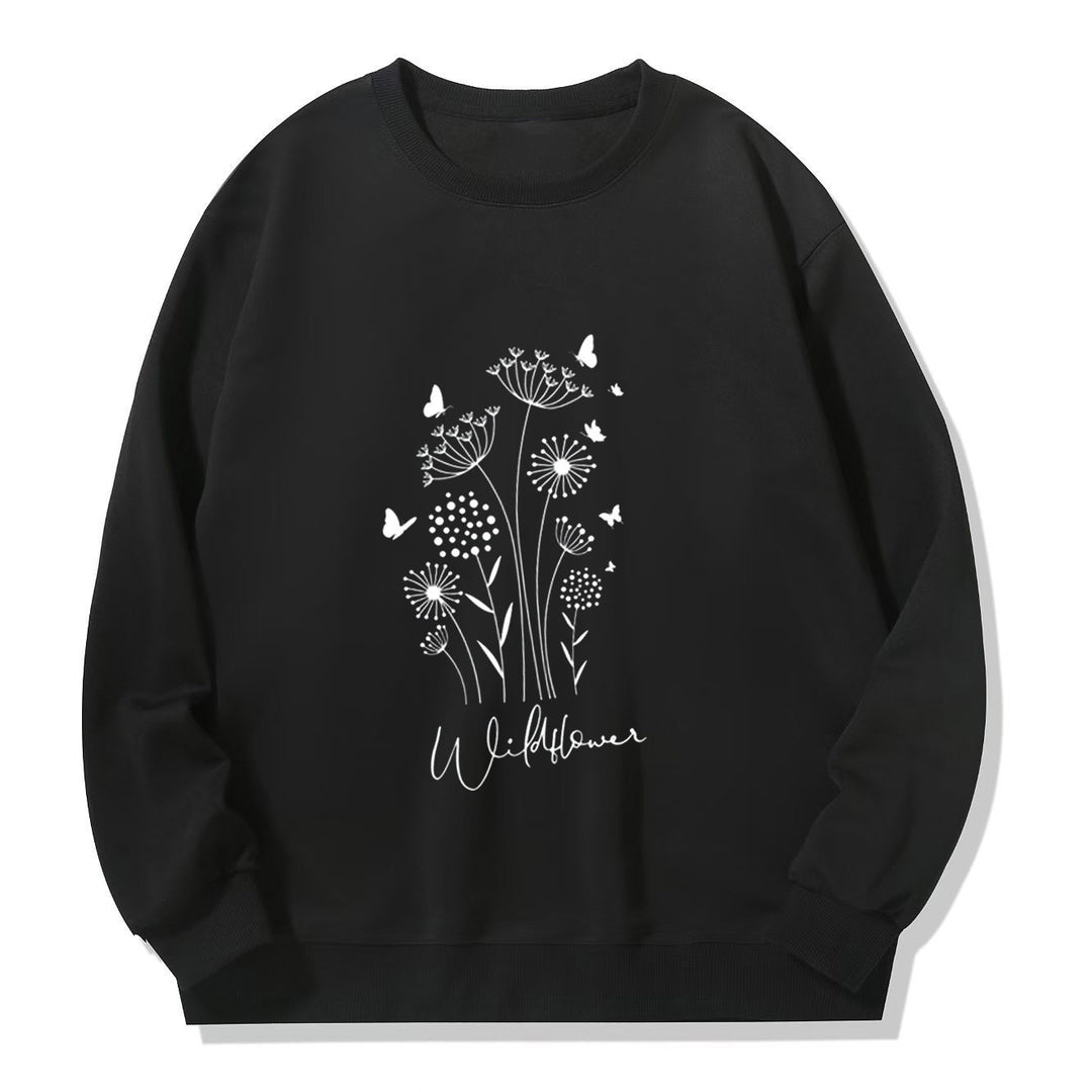Kvinnelig sweatshirt med blomstertrykk av villblomster og koselig innerfor Skjora