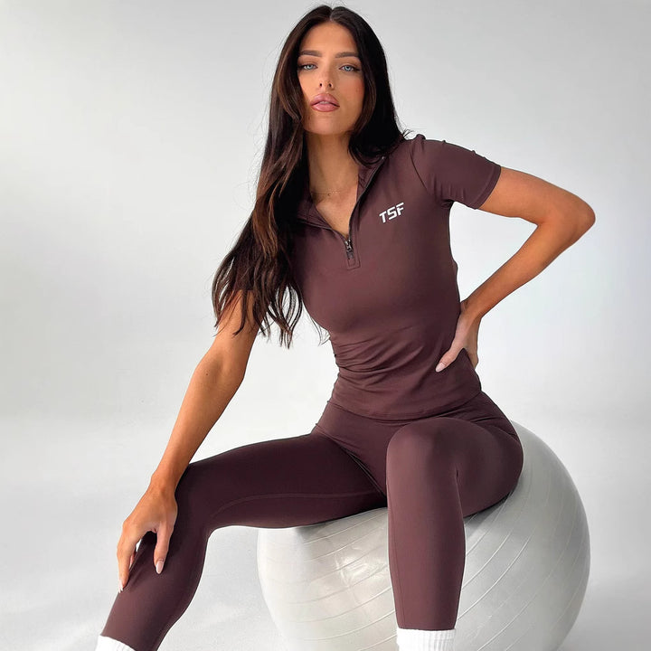 Dame Sporty Kort Overall med funksjonell glidelås og figursydde detaljer Skjora