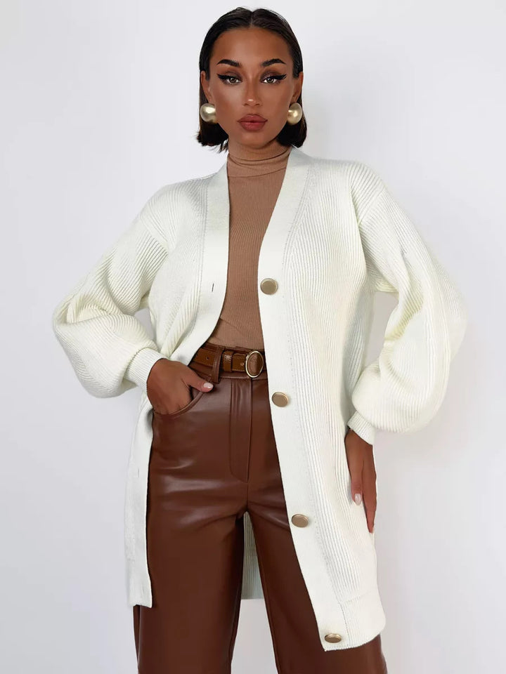 Kvinnens strikket frakk med oversized snitt og elegante knappedetaljer Skjora
