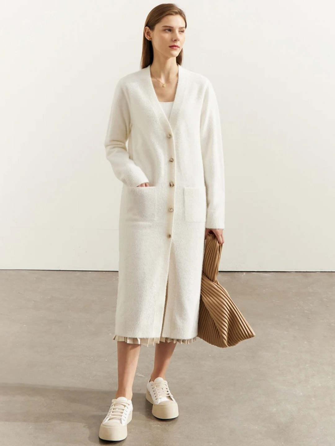 Langstrikket cardigan med knapper Beige